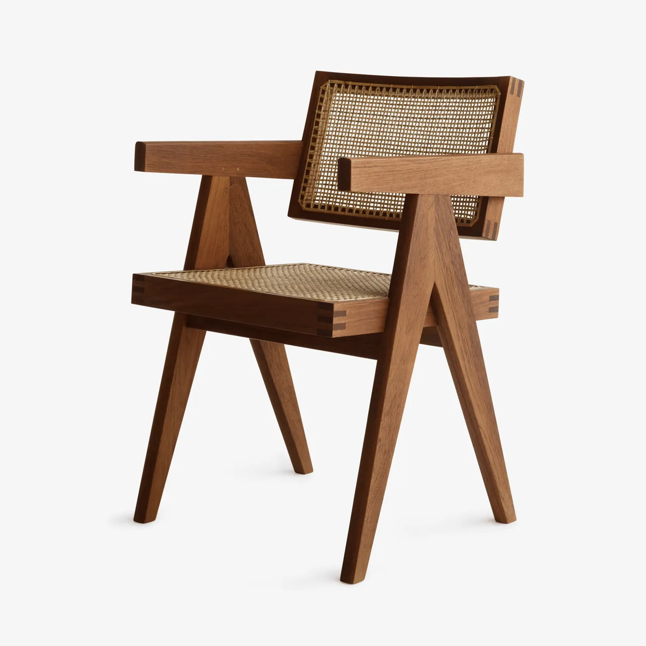 An angular brown armchair with an open woven seat/back pattern on a pale background.